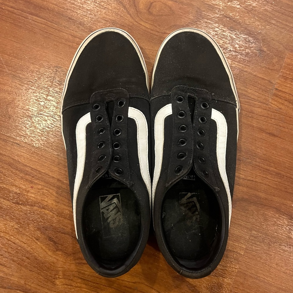 Size 9.5 women black Vans with white stripes (no laces)